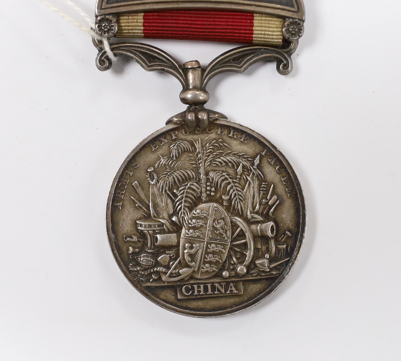 An 1843 Victoria China War Medal, unnamed, with bar for Canton 1857